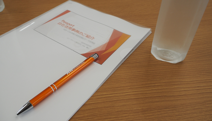 Passport users gathering event slides and pen